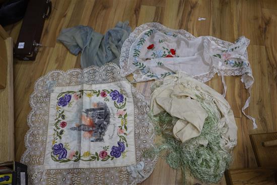 A 19th century Indian embroidered panel, a woven stole, a chiffon stole, a fringed shawl, a collection of ribbon and ribbon work, etc.